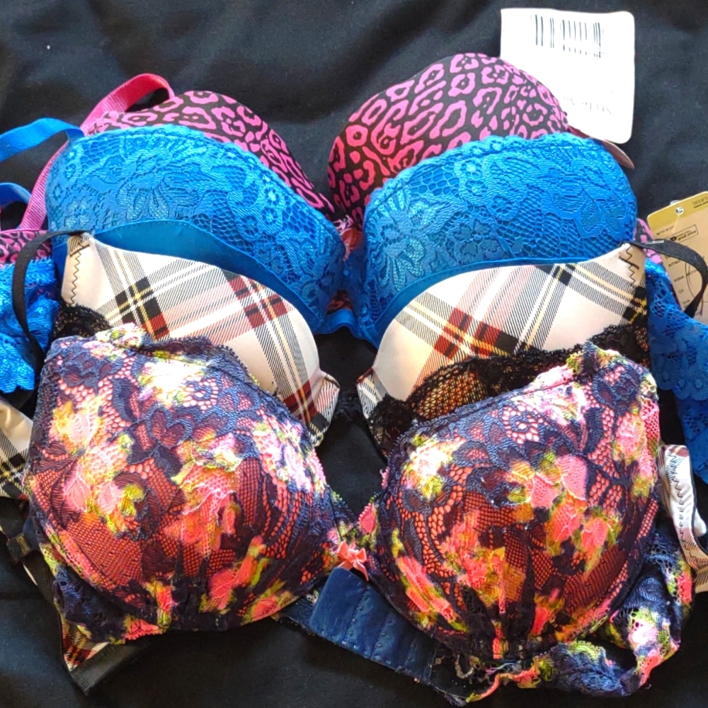 3 brand new bras and one that has been worn once